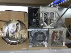 Three Lord of The Rings collectors DVD gift sets, poster collection and three Danbury Mint collector