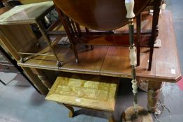 A late Victorian extending dining table on turned legs