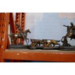 A selection of figures, metal and china of men on horseback and dogs