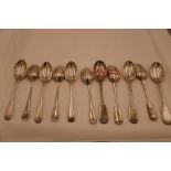 A set of six silver dessert spoons, hallmarked Sheffield 1920, Walker and Hall. Also with a set of f