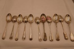 A set of six silver dessert spoons, hallmarked Sheffield 1920, Walker and Hall. Also with a set of f