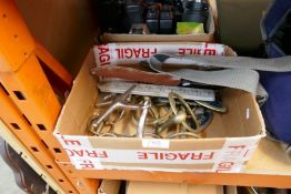 Box of brass, stainless steel, horse bits, car badges