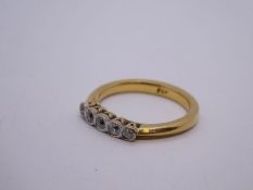 Pretty 18ct yellow gold graduating five stone rubover set diamond ring, marked 750, size N, 3.7g app