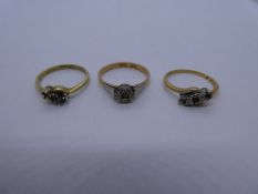 Three 18ct and platinum gold rings, stones removed, all marked,7.1g approx, all AF