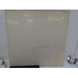 'The Beatles', a copy of the white album, No 0043536, was deep cleaned in 2016, (with poster by no c