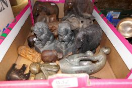 Selection of carved figures and animals mostly in store