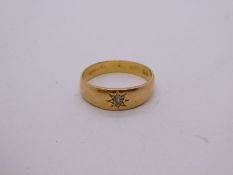 18ct yellow gold gypsy ring with starburst set single diamond, 3.6g approx, marked 18ct, size M