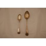 A silver Victorian dessert spoon hallmarked London 1842, John and Henry Lias. Also with a heavy silv