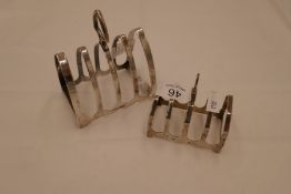 A silver Viners Ltd toast rack, hallmarked Sheffield 1932. Also with another smaller toast rack, hal