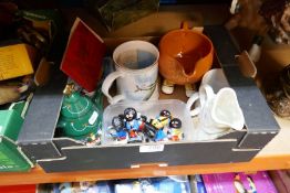 A box of small vintage collectables including commemorative mugs and Robinsons collectables