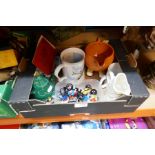 A box of small vintage collectables including commemorative mugs and Robinsons collectables