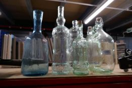 Six vintage glass bottles/vases