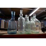 Six vintage glass bottles/vases