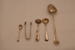 A Georgian silver serving spoon, hallmarked London 1805. Also with a pair of Georgian silver mustard