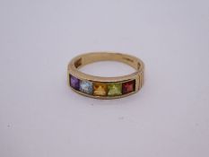 9ct yellow gold band ring Channel set with five coloured gemstones, marked 375, 2.4g approx, Size L