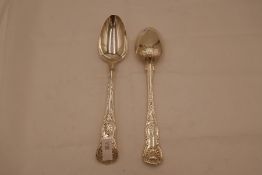 A pair of Georgian Silver heavy ornate serving spoons with King's pattern. Hallmarked London 1836 Ma