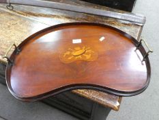 An Edwardian Mahogany kidney shaped tray, 56cms