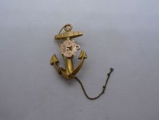 Of Naval interest, 9ct yellow gold brooch in the form of an anchor with applied floral detail, 4cm l