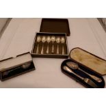 Cased cutlery to include a set of six silver teaspoons with ornate, floreated engraved handles hallm