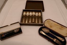 Cased cutlery to include a set of six silver teaspoons with ornate, floreated engraved handles hallm