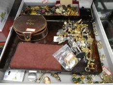Large tray containing mixed costume jewellery including badges, brooches, earrings, cufflinks, boxed