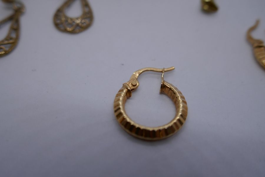 Collection 9ct and yellow metal earrings including hoops, drop examples, set amber coloured stones, - Image 3 of 4