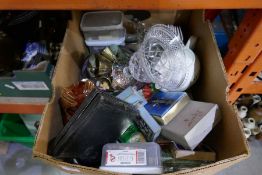 A box of mixed collectables including cards, brass ware, etc