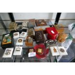 A selection of miniature boxes, stamp holders, some being embossed with crests and decorations