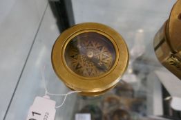 Compass with magnifying glass