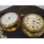 An Elliott brass ships bulkhead clock and a brass Sestrel Ships Barometer
