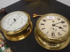 An Elliott brass ships bulkhead clock and a brass Sestrel Ships Barometer