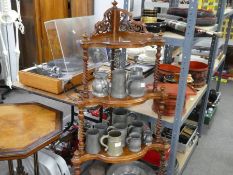 A Victorian walnut corner Whatnot, having four shelves on twisted supports, height 140cms