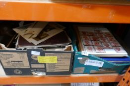 Two boxes of ephemera including postcards, pictures, books etc