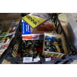 A box of vintage diecast vehicles and memorabilia mostly relating to Formula 1