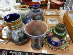 A quantity of Doulton stoneware vases and jugs, two framed Mintons tiles and sundry