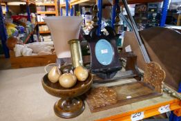 A pair of brass fire dogs, two book troughs and sundry