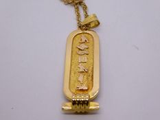 9ct yellow gold neckchain, approx 5g hung with 18ct yellow gold hieroglyphic pendant, hallmarked app
