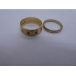 9ct yellow gold wedding band marked 375, together with another wedding band with starburst decoratio