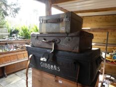 Two old wooden trunks and four others