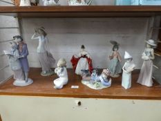 A quantity of LLadro Nao and Royal Doulton figures (8)