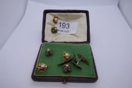 Pair of yellow gold cufflinks, set with blue opals, with import marks Vienna 1902 - 1937 and two set