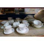 Set of Worcester 'Gold Chantilly' pattern teaware, including plates, saucers, cups, etc