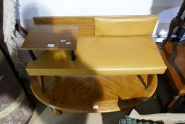 A retro telephone seat and an oak oval coffee table