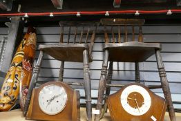 Two kitchen stickback chairs and two mantle clocks, one being stamped 'Smiths'