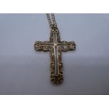 9ct yellow gold curb link necklace marked 375, hung with a large yellow 9ct yellow gold cross. 5 x 3