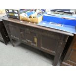 An antique oak panel coffer with carved frieze, 115cms