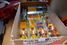 A selection of boxed Country Life die cast tractors, etc