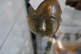 Four faced Buddha head(s)