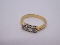 18ct yellow gold diamond trilogy ring, size P/Q, central stone 0.20 carat, 3.7g approx. Gold content