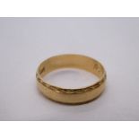 9ct yellow gold wedding band, 2g approx, marked 375, size L. Gold content value estimate given at th